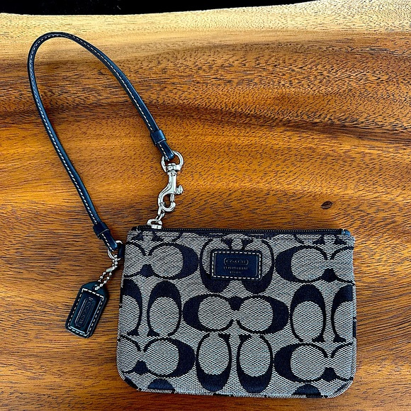 Coach Handbags - Coach Monogram Wristlet in Black Monogram & Leather. Charity Listing.